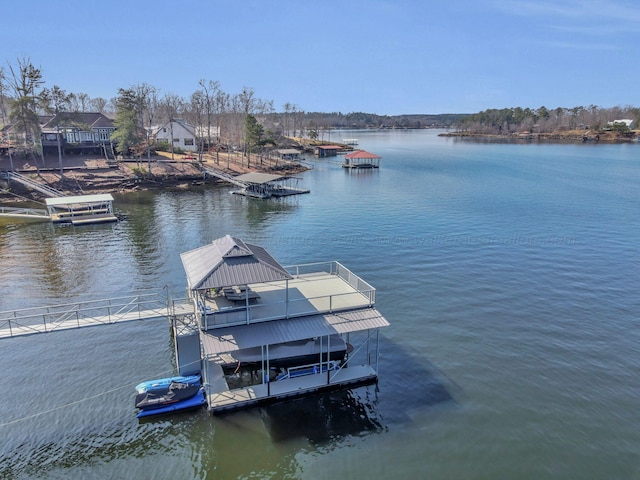 view of dock featuring a water view and boat lift