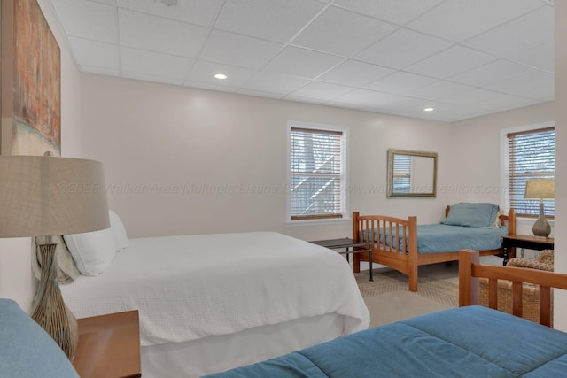 bedroom featuring recessed lighting and a paneled ceiling