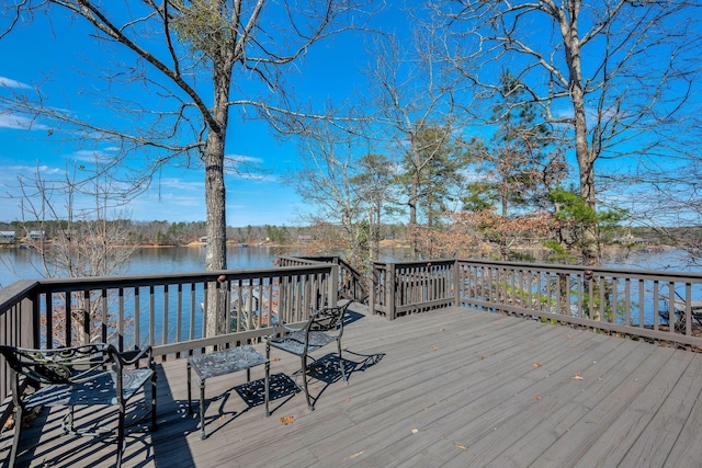 wooden terrace with a water view