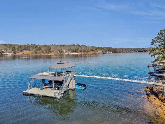 dock area featuring a water view