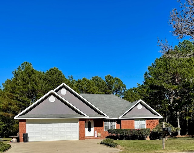 single story home featuring driveway, an attached garage, brick siding, and a front yard