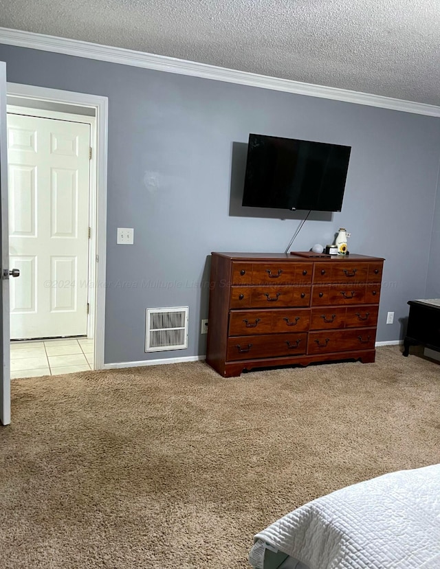 bedroom featuring carpet, ornamental molding, baseboards, and a textured ceiling