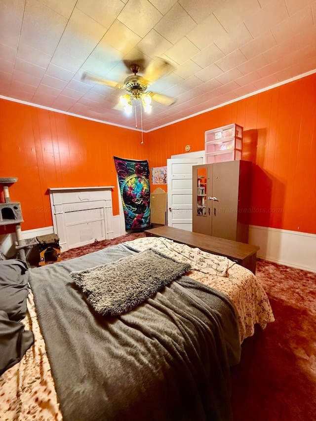 1902 Williams St, Jasper, AL 35501 - bedroom featuring crown molding, ceiling fan, and wood walls