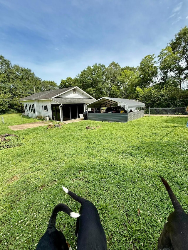 1902 Williams St, Jasper, AL 35501 - view of yard with a detached carport and view of scattered trees