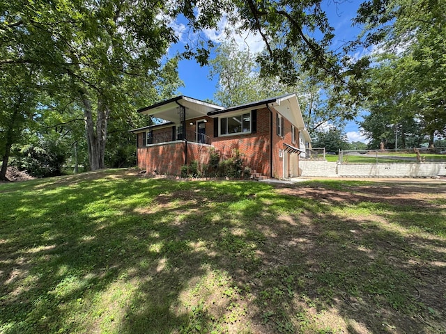 8502 Old Bagley Rd, Dora, AL 35062 - view of front of house featuring brick siding, a garage, and driveway