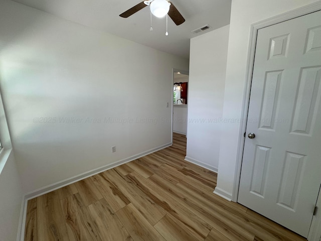 8502 Old Bagley Rd, Dora, AL 35062 - unfurnished bedroom with light wood-style floors and ceiling fan