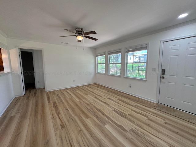 8502 Old Bagley Rd, Dora, AL 35062 - unfurnished living room with ceiling fan, light wood finished floors, and crown molding