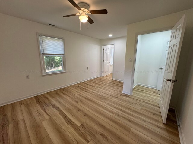 8502 Old Bagley Rd, Dora, AL 35062 - spare room featuring light wood-style flooring, ceiling fan, and recessed lighting