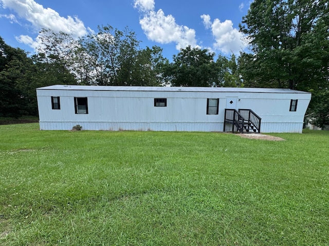 8502 Old Bagley Rd, Dora, AL 35062 - rear view of house featuring a yard and entry steps