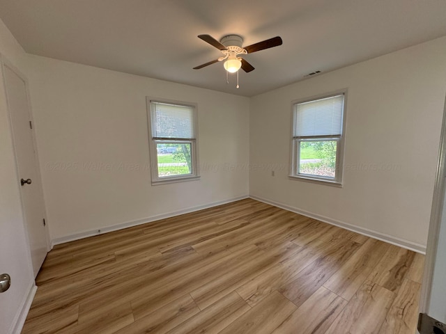 8502 Old Bagley Rd, Dora, AL 35062 - unfurnished room featuring healthy amount of natural light, light wood-style flooring, and ceiling fan