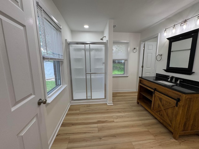 8502 Old Bagley Rd, Dora, AL 35062 - full bath with a shower stall, vanity, wood finished floors, and recessed lighting