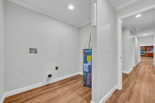 laundry area with electric water heater, crown molding, washer hookup, light wood-type flooring, and hookup for an electric dryer