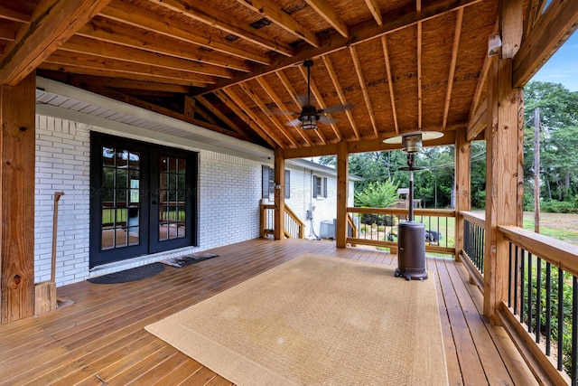 deck featuring french doors and ceiling fan