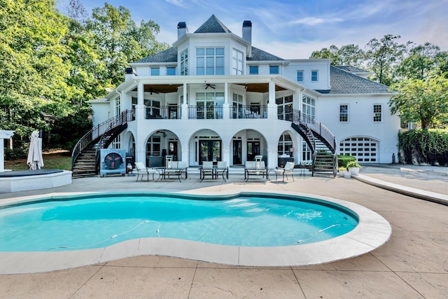 55 County Road 142, Crane Hill, AL 35053 - back of house with a ceiling fan, a balcony, stairs, and a patio area