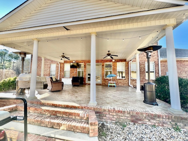 view of patio / terrace featuring ceiling fan