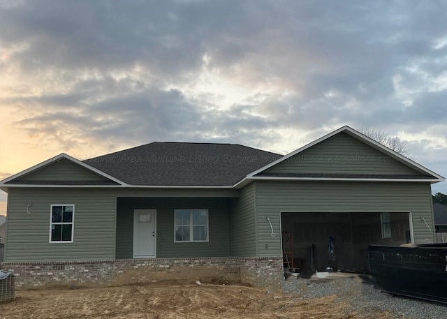 view of front of property featuring a garage