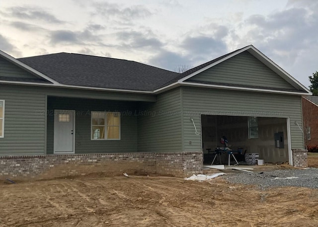 view of front of property featuring a garage