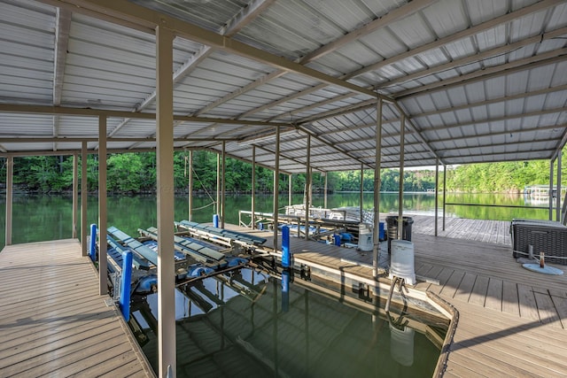 dock area featuring a water view and boat lift