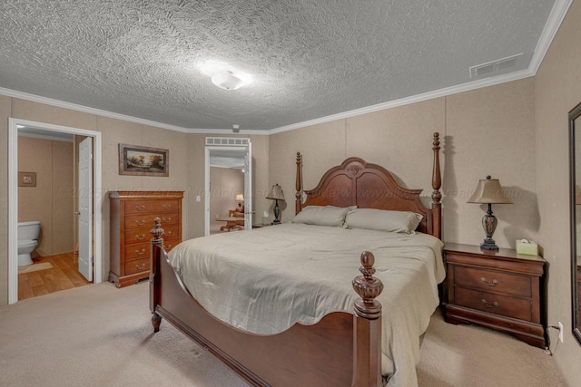 bedroom featuring visible vents, ornamental molding, carpet floors, connected bathroom, and a textured ceiling