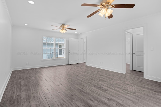 spare room featuring crown molding, baseboards, ceiling fan, wood finished floors, and recessed lighting