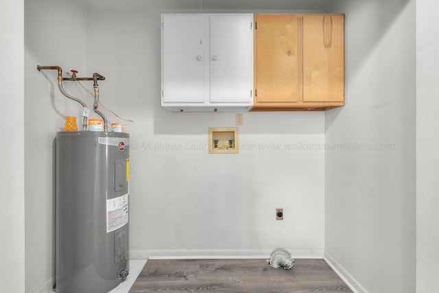 1768 Pineywoods Sipsey Rd, Jasper, AL 35504 - washroom featuring electric water heater, cabinet space, electric dryer hookup, washer hookup, and wood finished floors