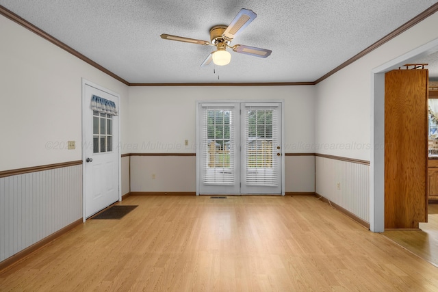 1768 Pineywoods Sipsey Rd, Jasper, AL 35504 - empty room featuring light wood-style flooring, a textured ceiling, crown molding, and ceiling fan