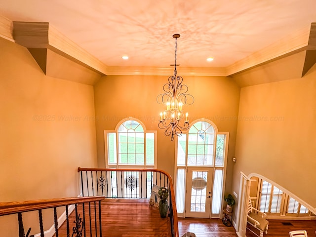 1000 Foothill Rd, Winfield, AL 35594 - foyer featuring a chandelier, wood finished floors, high vaulted ceiling, and crown molding