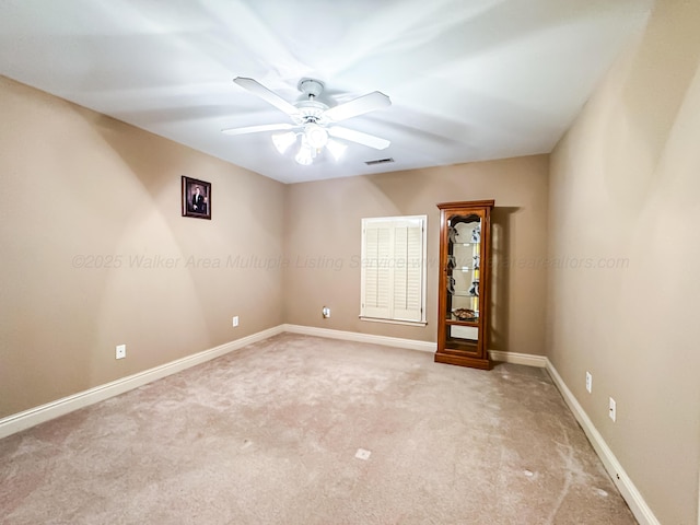 1000 Foothill Rd, Winfield, AL 35594 - empty room with light colored carpet, a ceiling fan, and baseboards