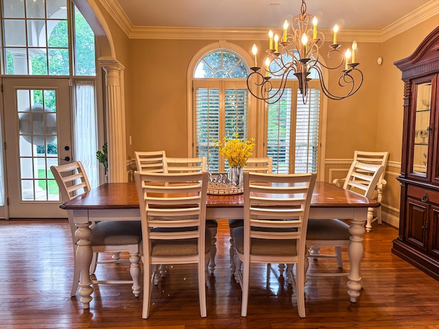 1000 Foothill Rd, Winfield, AL 35594 - dining room with dark wood-style flooring, crown molding, a wainscoted wall, and a chandelier