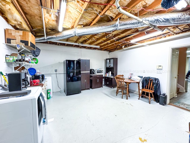 1000 Foothill Rd, Winfield, AL 35594 - unfinished basement featuring freestanding refrigerator