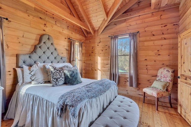 bedroom with light wood-type flooring, wood walls, wood ceiling, and lofted ceiling with beams