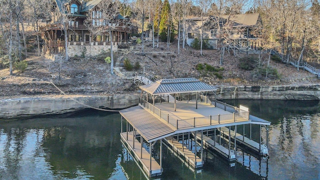 view of dock featuring a water view and boat lift