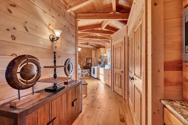 bathroom with wood ceiling, vaulted ceiling with beams, wood walls, and hardwood / wood-style floors