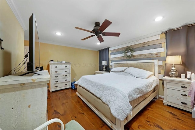 bedroom featuring recessed lighting, ornamental molding, ceiling fan, and wood finished floors