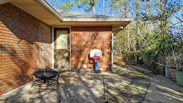 view of patio featuring an outdoor fire pit
