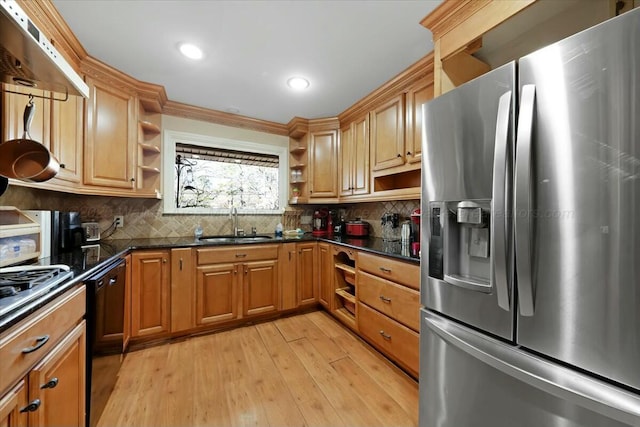 kitchen with open shelves, under cabinet range hood, backsplash, light wood finished floors, and appliances with stainless steel finishes