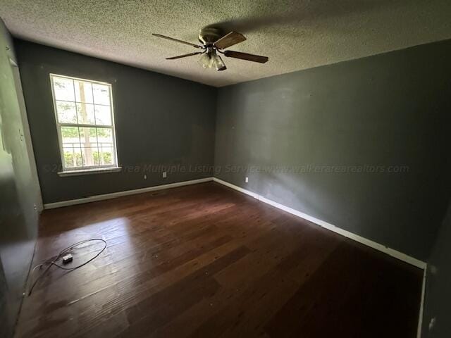 151 Bassmen Dr, Parrish, AL 35580 - empty room with a ceiling fan, a textured ceiling, wood finished floors, and baseboards