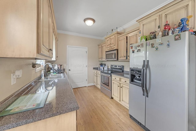 7442 Cresview Ln, Dora, AL 35062 - kitchen featuring appliances with stainless steel finishes, crown molding, dark countertops, light wood-style flooring, and light brown cabinets