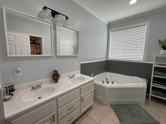 full bath featuring a sink, tile patterned floors, ornamental molding, and a garden tub