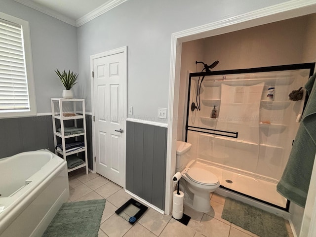 bathroom featuring a garden tub, tile patterned floors, a stall shower, and ornamental molding