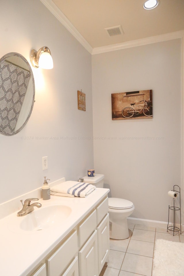 bathroom with visible vents, crown molding, tile patterned flooring, vanity, and toilet