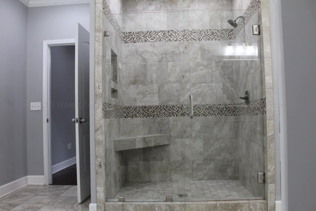 381 Gray Cir, Winfield, AL 35594 - full bathroom with a shower stall and crown molding