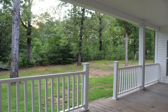 381 Gray Cir, Winfield, AL 35594 - wooden terrace with a lawn