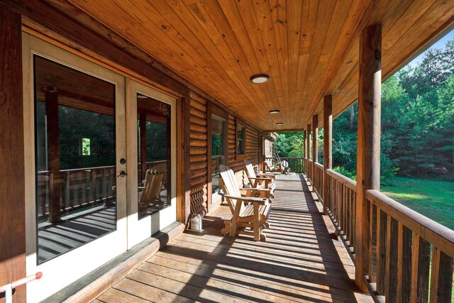 deck featuring french doors and a porch