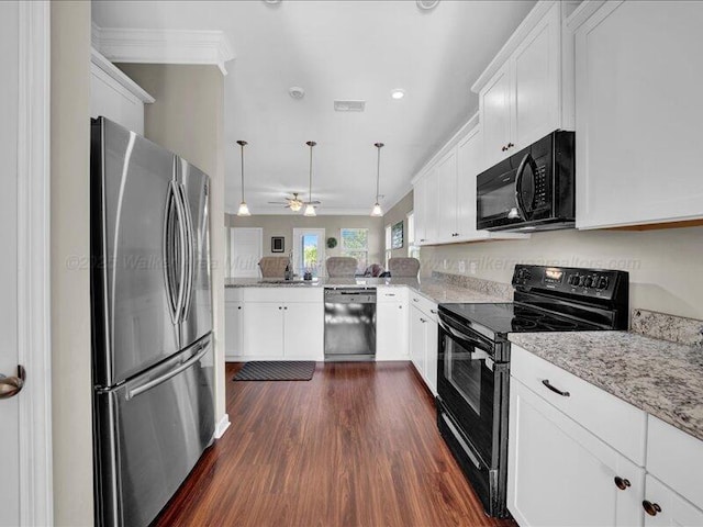kitchen with white cabinetry, black appliances, dark wood-type flooring, and light stone counters