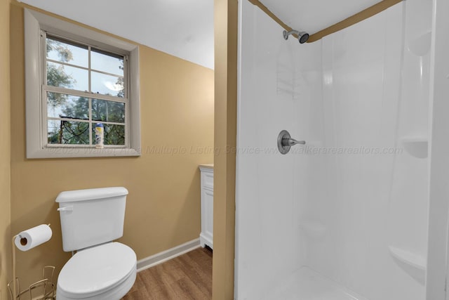 1600 Birmingham Ave, Jasper, AL 35501 - full bathroom with a shower stall and wood finished floors