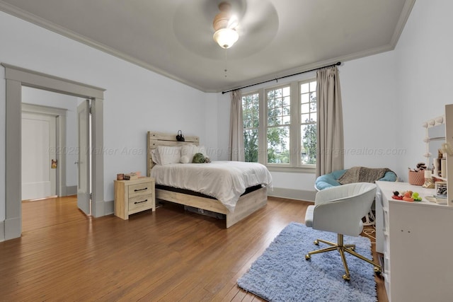 1600 Birmingham Ave, Jasper, AL 35501 - bedroom with ornamental molding, wood finished floors, and a ceiling fan