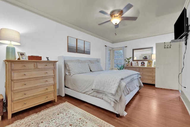 1600 Birmingham Ave, Jasper, AL 35501 - bedroom with dark wood-type flooring, ornamental molding, and ceiling fan
