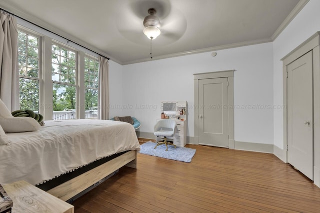 1600 Birmingham Ave, Jasper, AL 35501 - bedroom featuring ornamental molding, hardwood / wood-style floors, and a ceiling fan