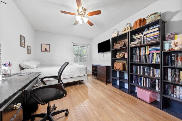 1812 N Walston Rd, Jasper, AL 35504 - bedroom with hardwood / wood-style floors, a desk, and ceiling fan